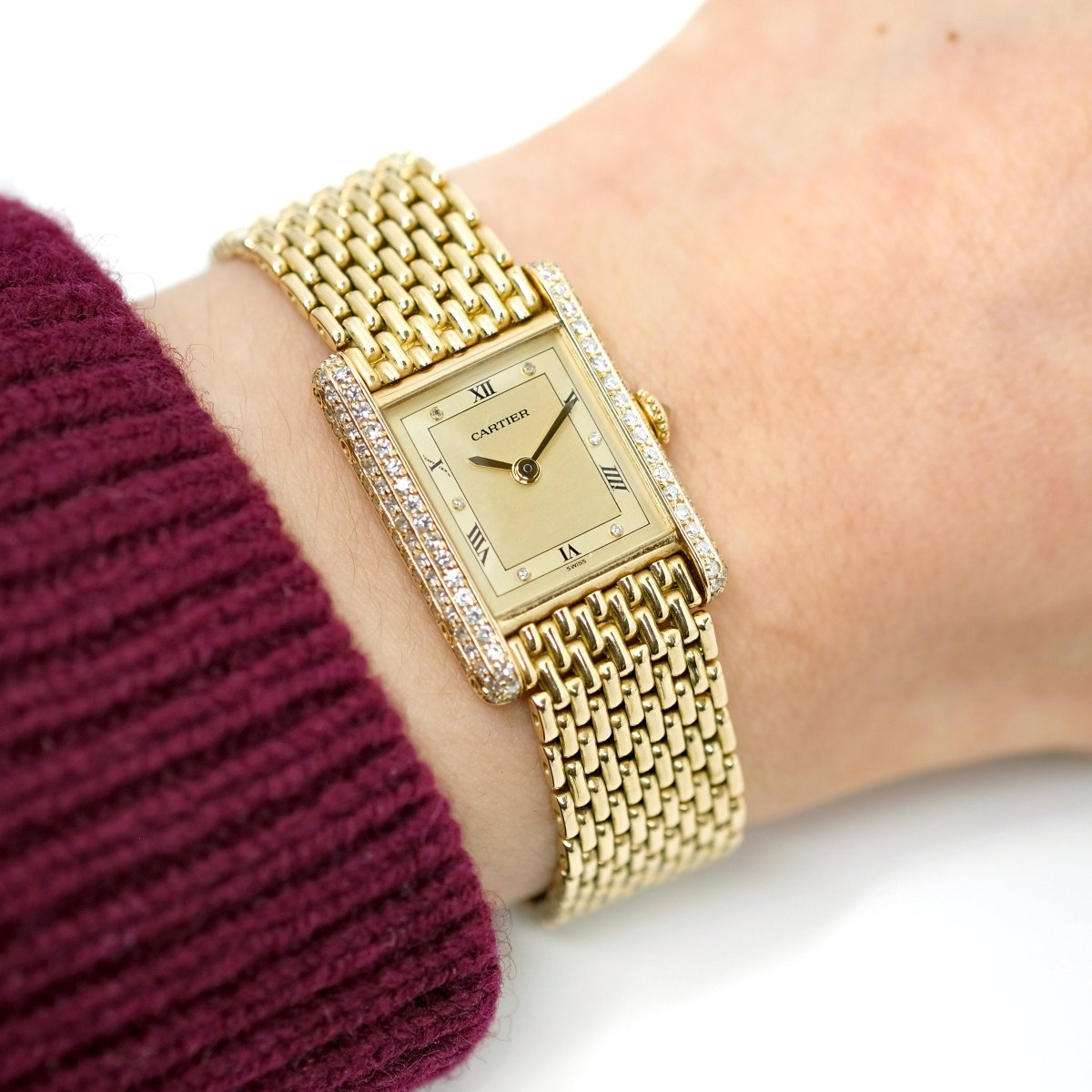 Montre CARTIER Tank Louis M en or jaune et diamants