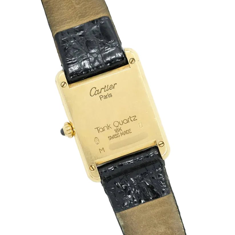 Montre CARTIER "Tank Louis Médium" en or jaune - Castafiore