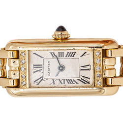 Montre CARTIER "Tank Mini" en or jaune et diamants - Castafiore