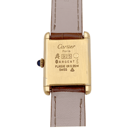 Montre Cartier "Tank Must" argent plaqué or, cuir. - Castafiore