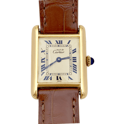 Montre Cartier "Tank Must" argent plaqué or, cuir. - Castafiore