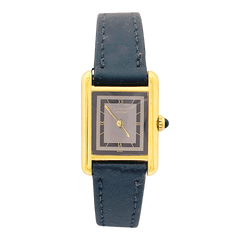 Montre CARTIER, "Tank Must", argent plaqué or et cuir - Castafiore