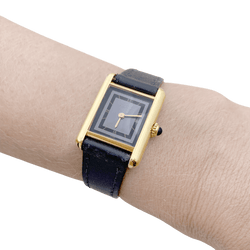 Montre CARTIER, "Tank Must", argent plaqué or et cuir - Castafiore