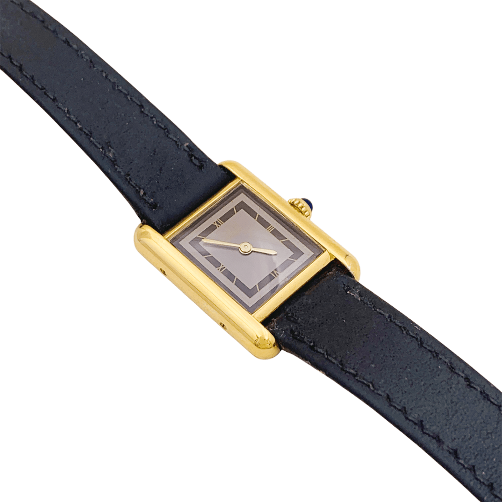 Montre CARTIER, "Tank Must", argent plaqué or et cuir - Castafiore