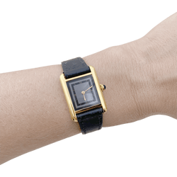 Montre CARTIER, "Tank Must", argent plaqué or et cuir - Castafiore