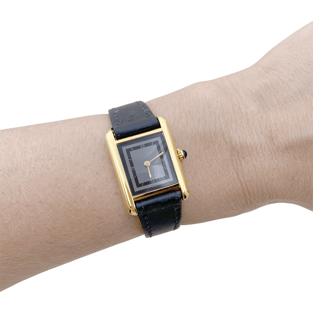 Montre CARTIER, "Tank Must", argent plaqué or et cuir - Castafiore