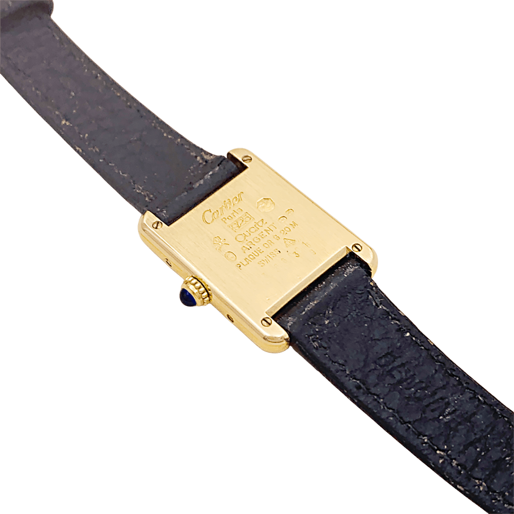 Montre CARTIER, "Tank Must", argent plaqué or et cuir - Castafiore