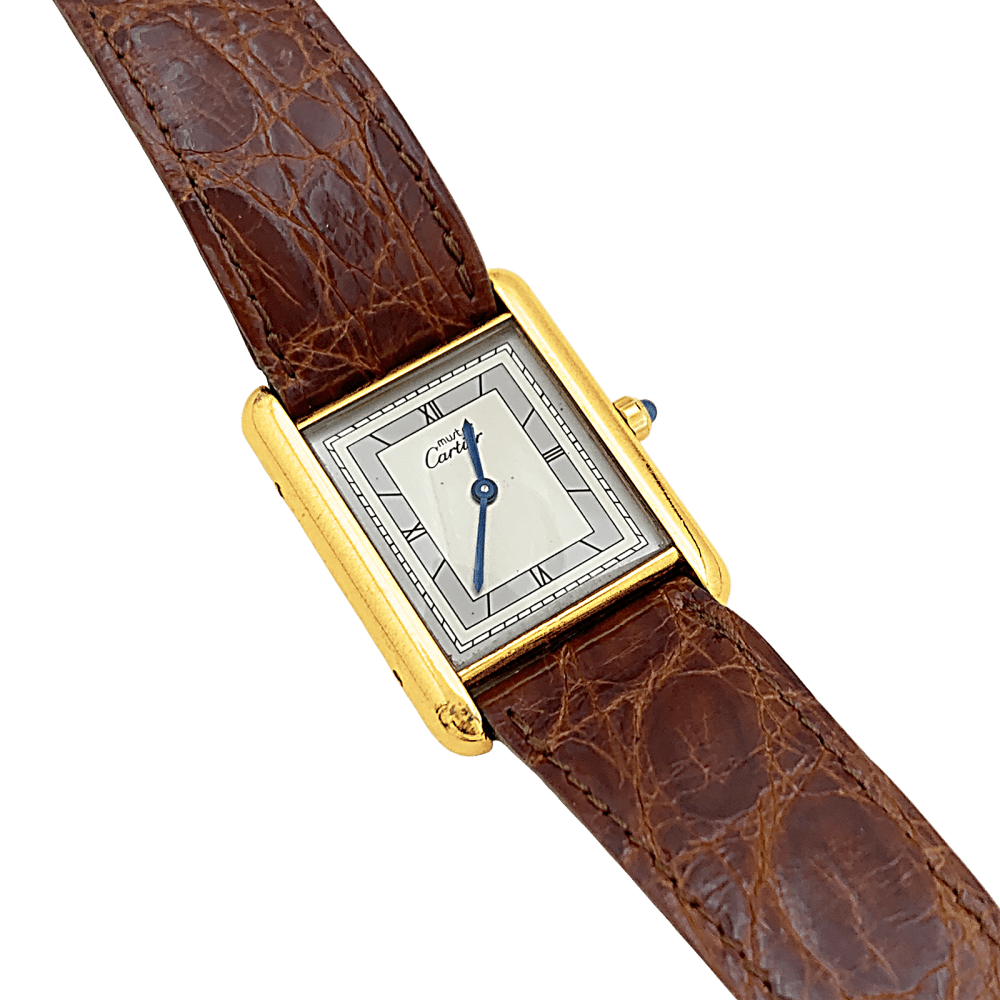 Montre CARTIER "Tank Must" en argent, acier, plaqué or et cuir - Castafiore