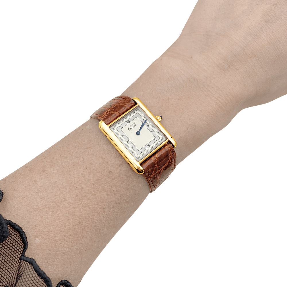 Montre CARTIER "Tank Must" en argent, acier, plaqué or et cuir - Castafiore
