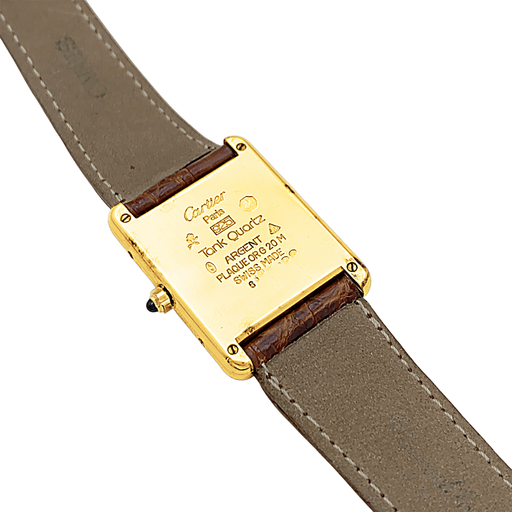 Montre CARTIER "Tank Must" en argent, acier, plaqué or et cuir - Castafiore