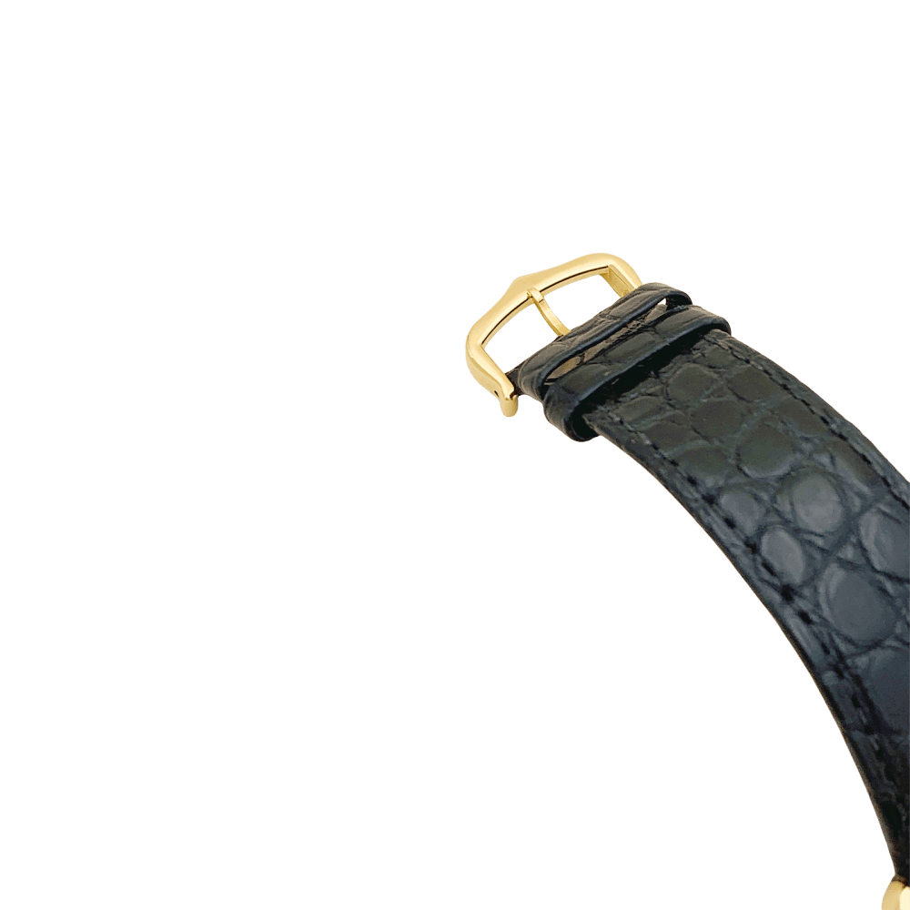 Montre CARTIER "Tank Solo" en or jaune, argent, cuir, acier et spinelle - Castafiore