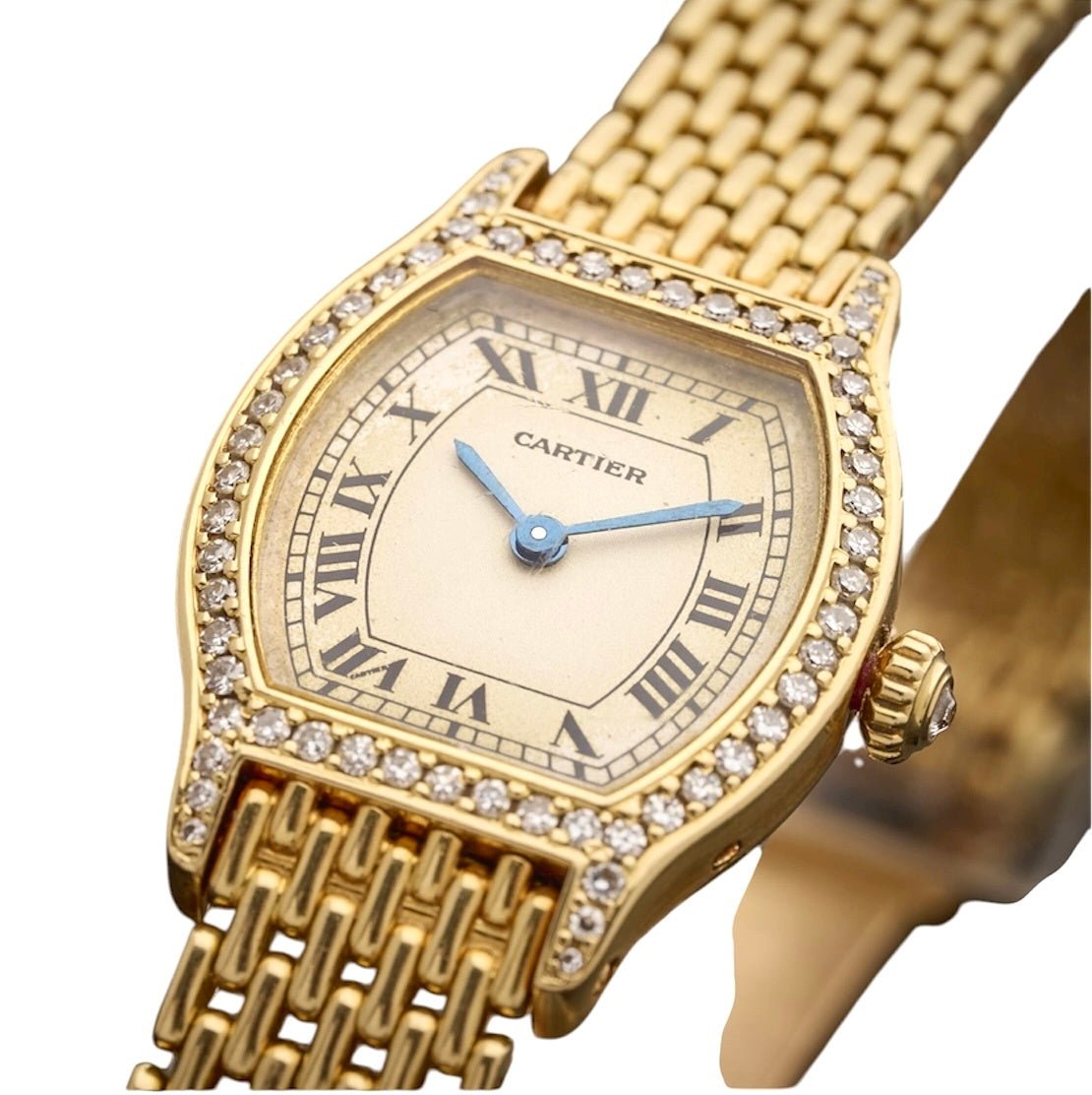 Montre CARTIER "Tortue" en or jaune, acier et diamants - Castafiore
