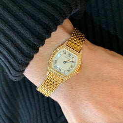 Montre CARTIER "Tortue" en or jaune, acier et diamants - Castafiore
