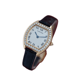Montre CARTIER "Tortue" en or jaune et diamants - Castafiore