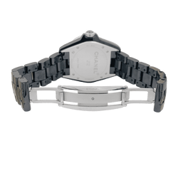 Montre Chanel, "J12", céramique noire, diamants. - Castafiore
