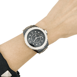 Montre Chanel, "J12", céramique noire, diamants. - Castafiore