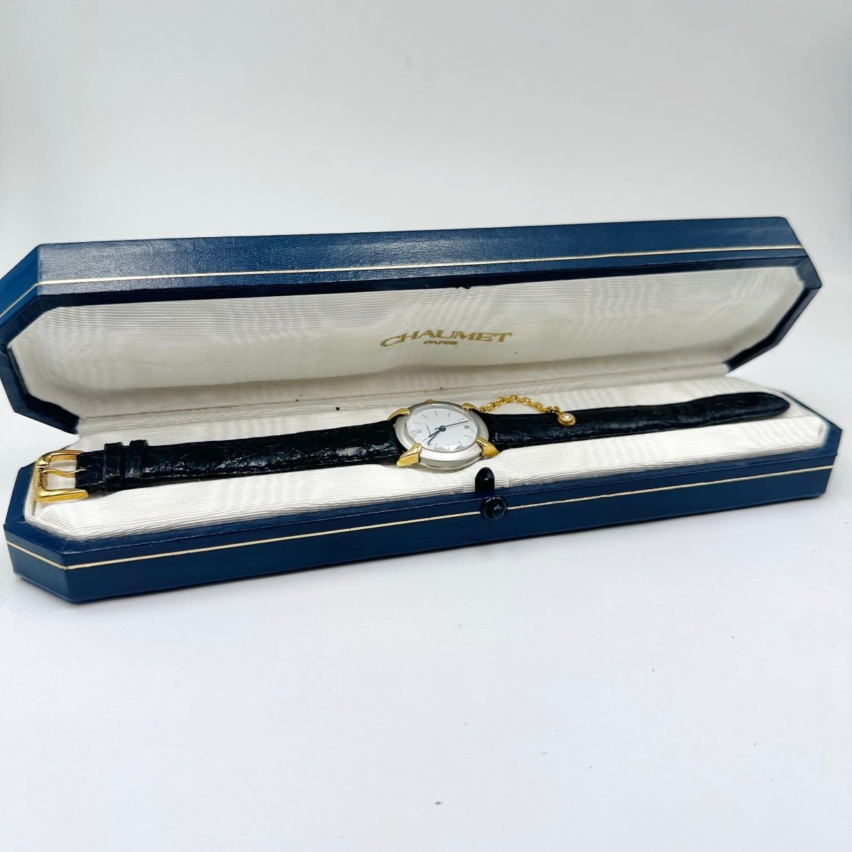 Montre CHAUMET "Élysées" en or jaune, acier, cuir et diamant - Castafiore