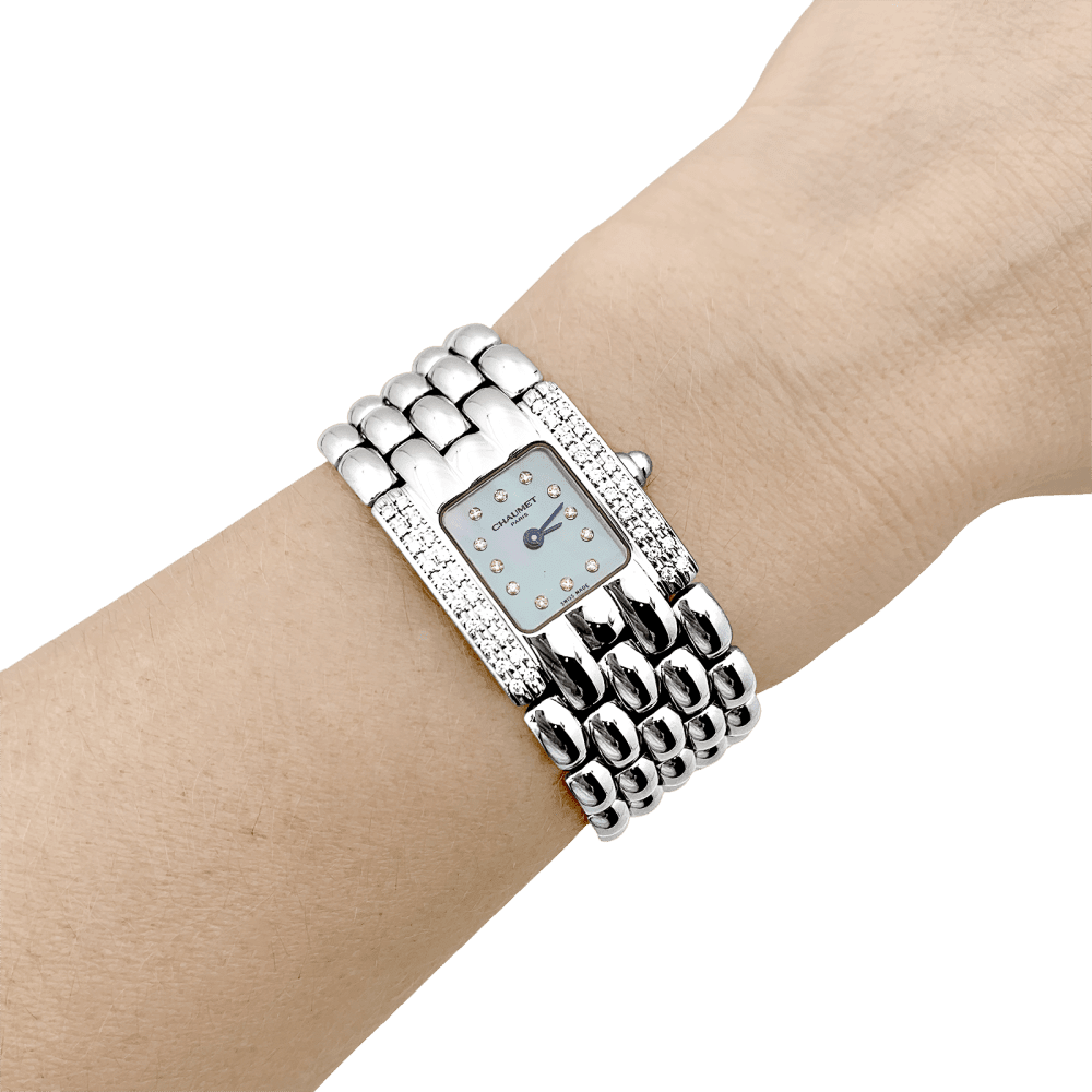 Montre CHAUMET "Khésis" en acier, nacre et diamants - Castafiore