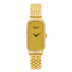 Montre CHOPARD "Classique" en or jaune, saphir et diamants - Castafiore