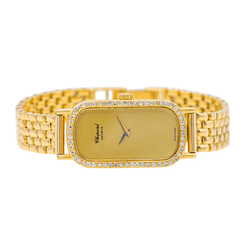 Montre CHOPARD "Classique" en or jaune, saphir et diamants - Castafiore