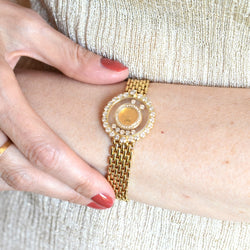 Montre CHOPARD "Happy Diamonds" en or jaune et diamants - Castafiore