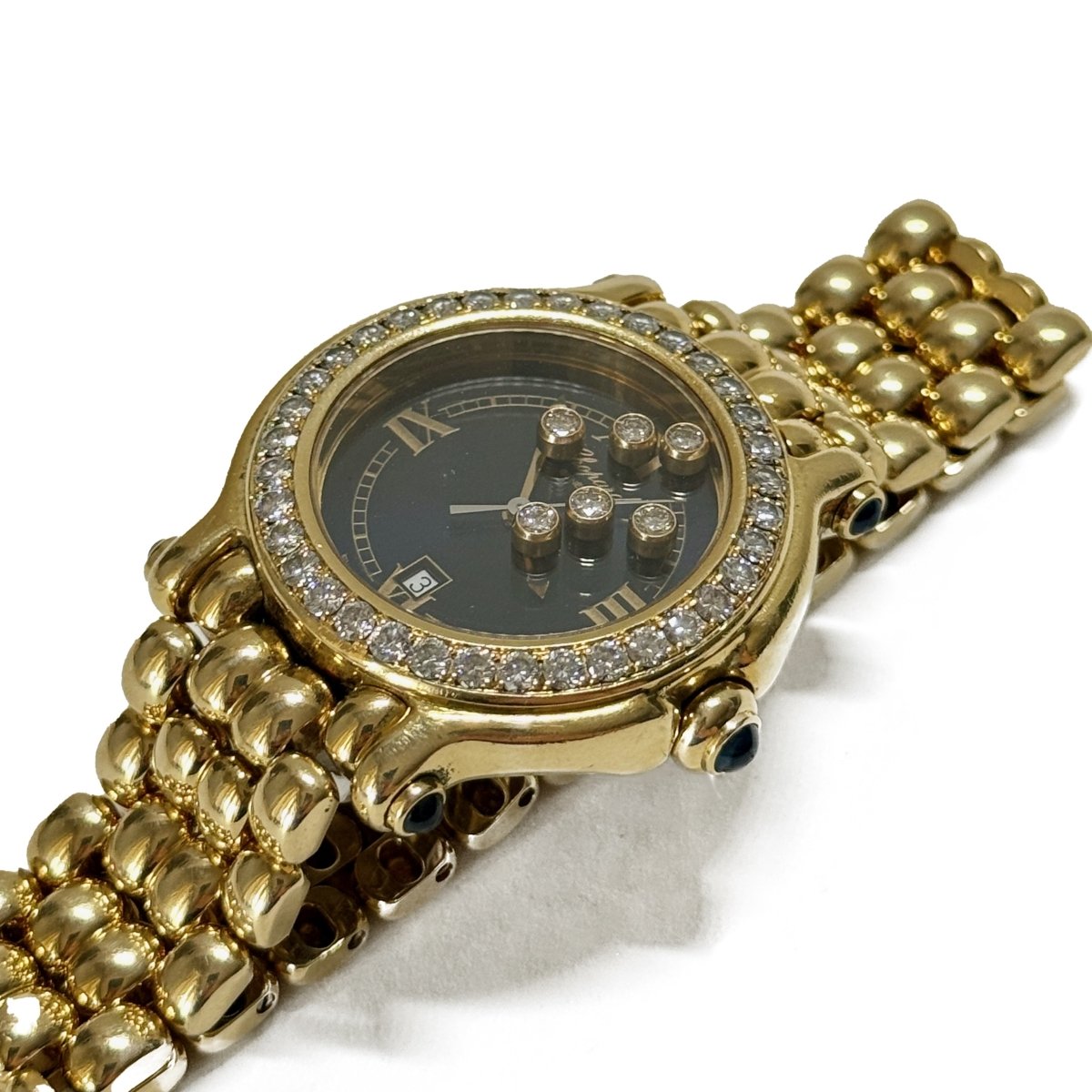 Montre CHOPARD Happy Sport en or jaune et diamants - Castafiore