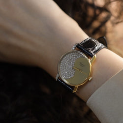 Montre CHOPARD Yin et yang en or jaune et gris diamants - Castafiore