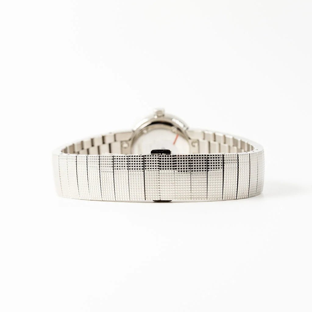 Montre de dame DIOR "La Baby D" en acier, nacre et diamants - Castafiore