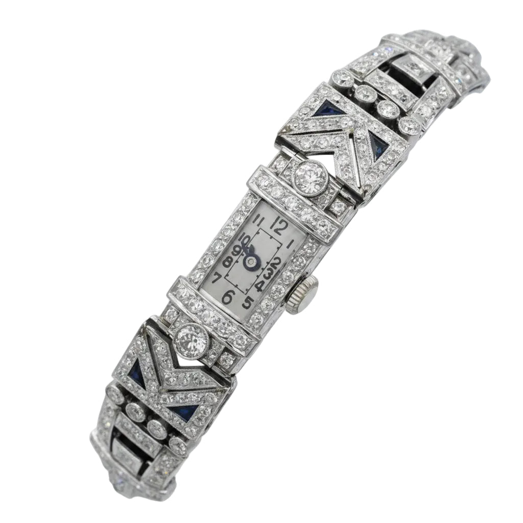 Montre de femme en or blanc, platine et diamants - Castafiore