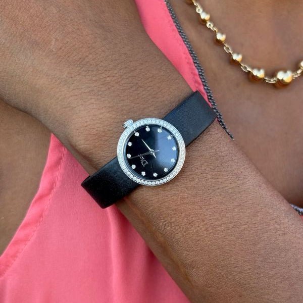 Montre DIOR "La D de Dior" en acier, quartz, saphir et diamants - Castafiore