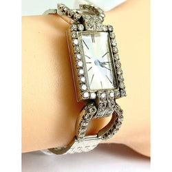 Montre en or blanc 18 carats sertie de diamants - Castafiore