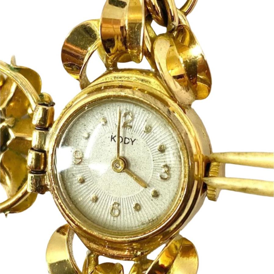 Montre en or jaune et diamant - Castafiore