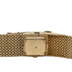 Montre en or jaune, platine et diamants - Castafiore