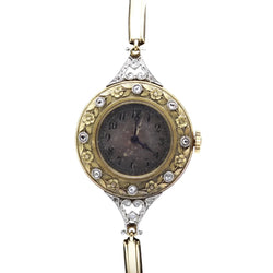 Montre en or jaune, platine et diamants - Castafiore