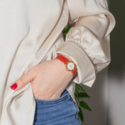 Montre FRED "Concerto" en or jaune, rubis, cuir, quartz et diamants - Castafiore