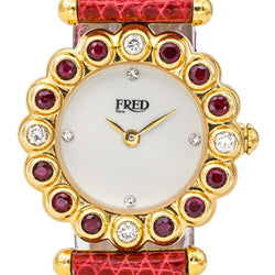 Montre FRED "Concerto" en or jaune, rubis, cuir, quartz et diamants - Castafiore