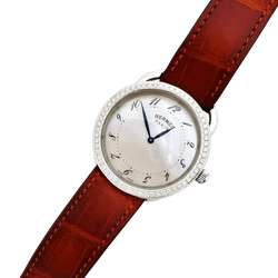 Montre HERMÈS "Arceau" en acier, cuir, nacre et diamants - Castafiore