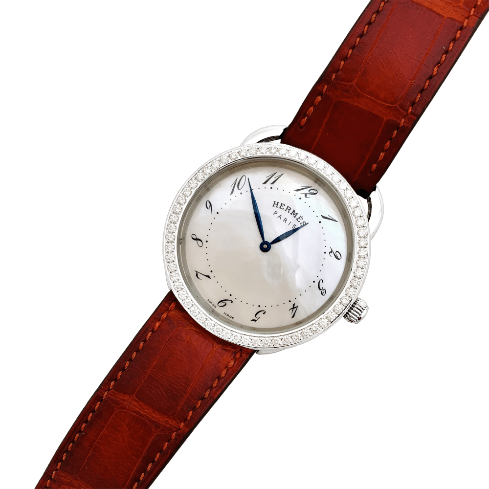 Montre HERMÈS "Arceau" en acier, cuir, nacre et diamants - Castafiore