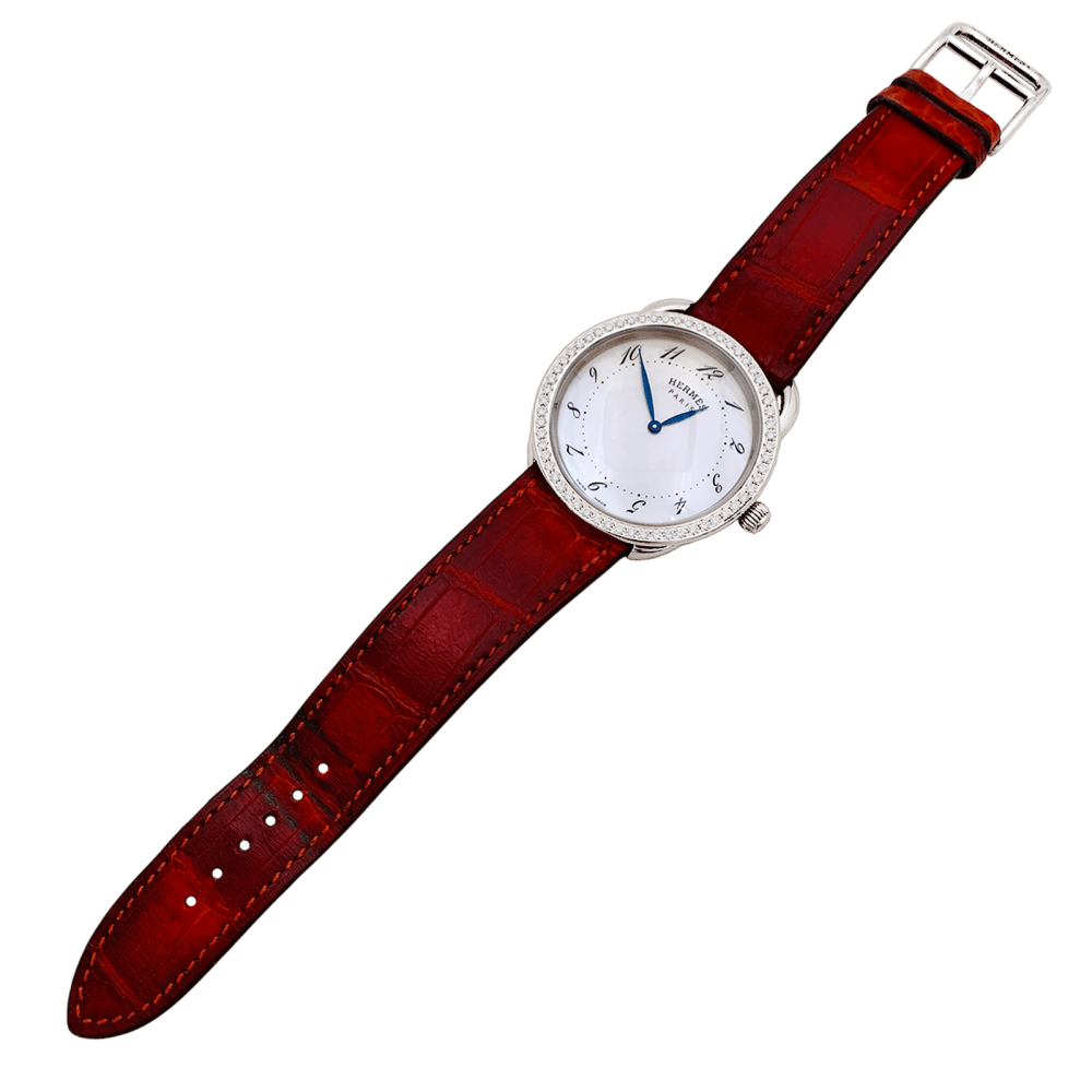 Montre HERMÈS "Arceau" en acier, cuir, nacre et diamants - Castafiore
