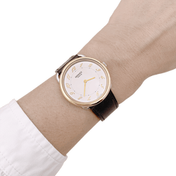 Montre HERMÈS "Arceau" en acier et cuir - Castafiore