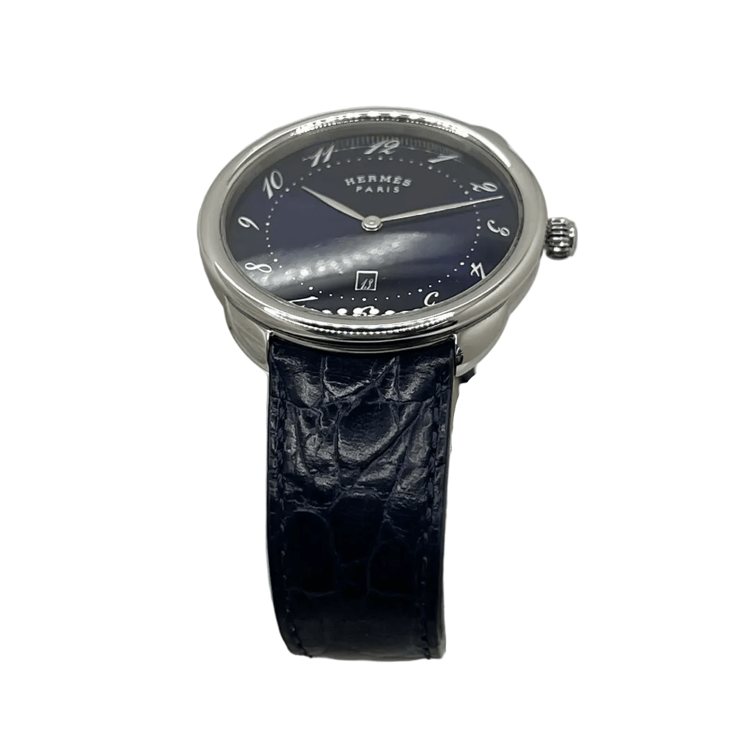 Montre HERMÈS "Arceau" en acier et cuir - Castafiore