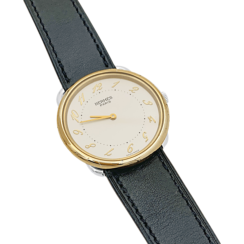 Montre HERMÈS "Arceau" en acier et cuir - Castafiore