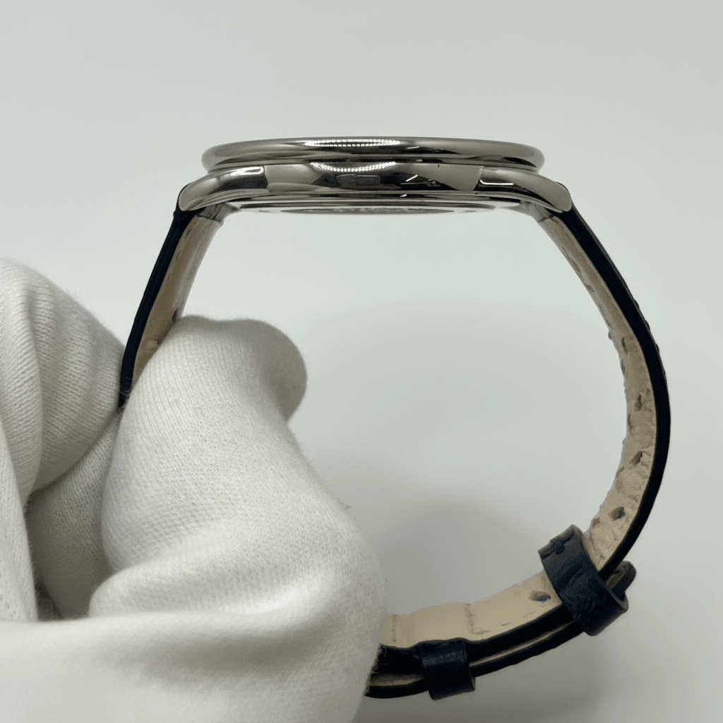 Montre HERMÈS "Arceau" en acier et cuir - Castafiore