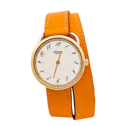 Montre HERMÈS "Arceau", plaqué or, acier, cuir. - Castafiore