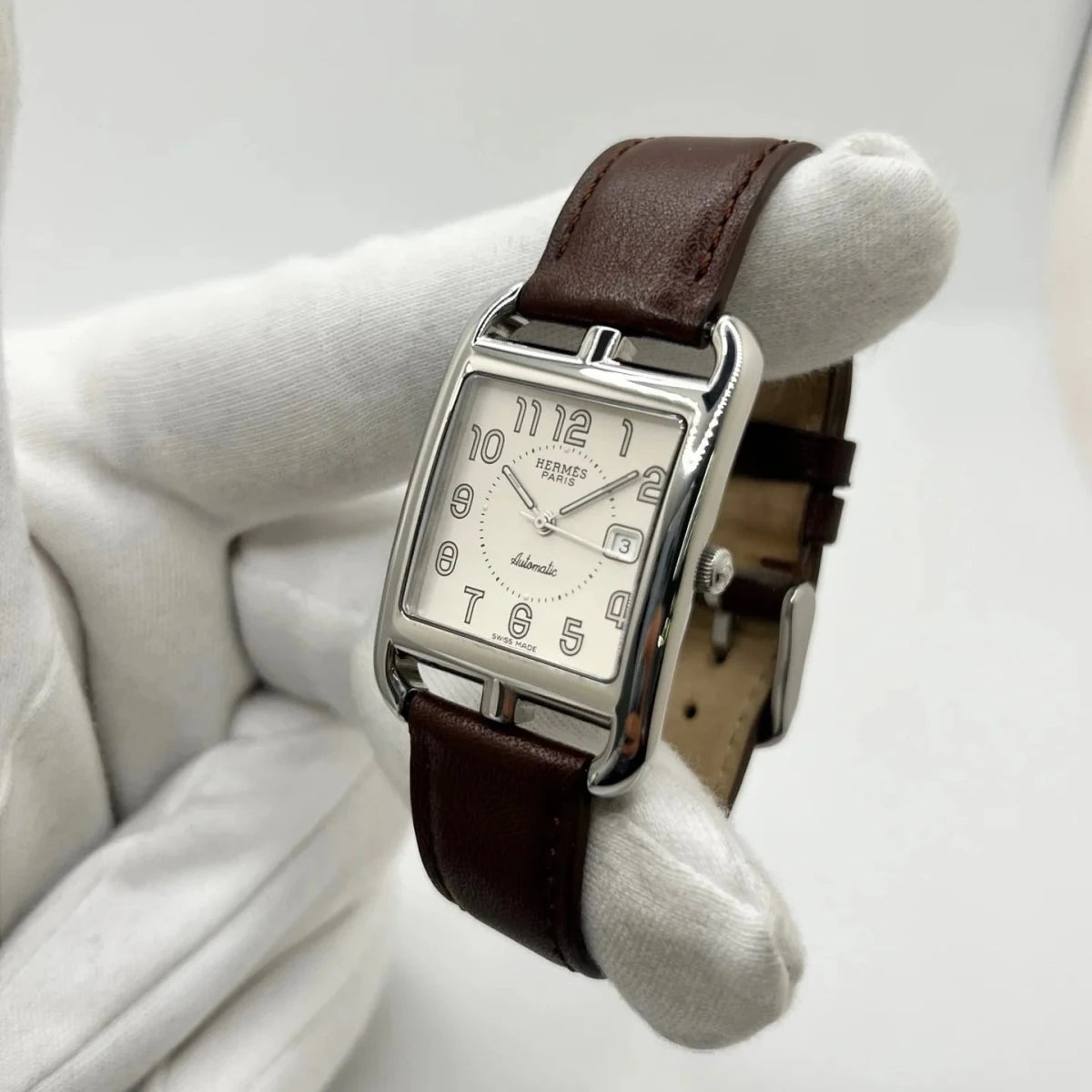 Montre HERMÈS "Cape Cod" en acier inoxydable et cuir - Castafiore