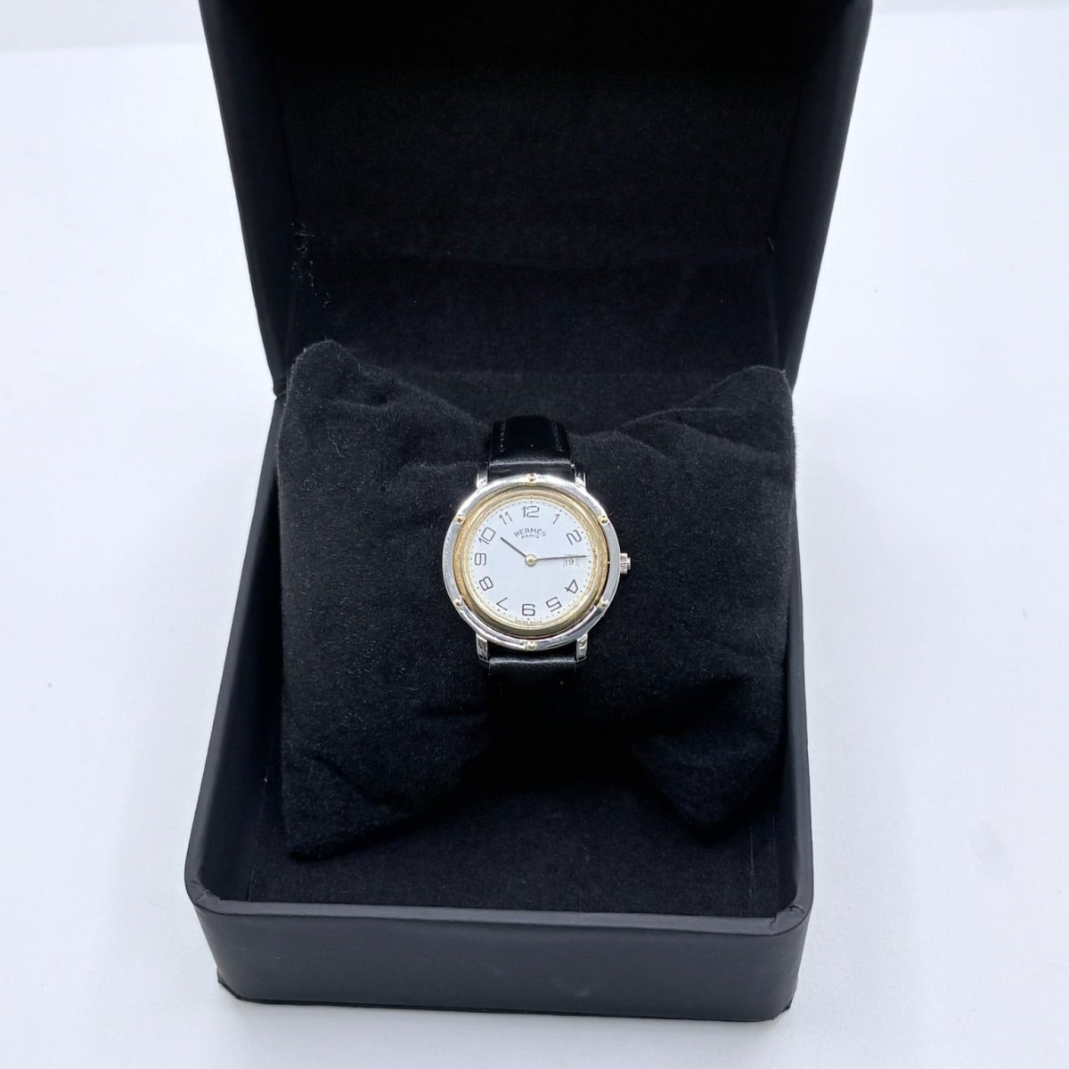 Montre HERMÈS "Clipper" en or jaune, acier et cuir - Castafiore
