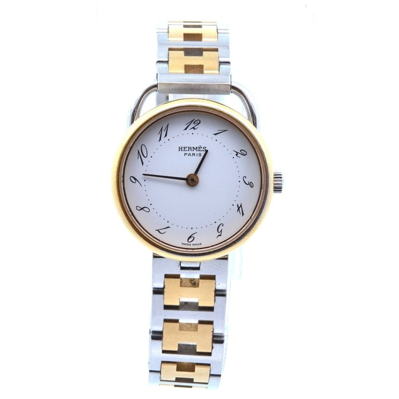 Montre HERMÈS en acier et plaqué or - Castafiore