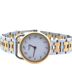 Montre HERMÈS en acier et plaqué or - Castafiore