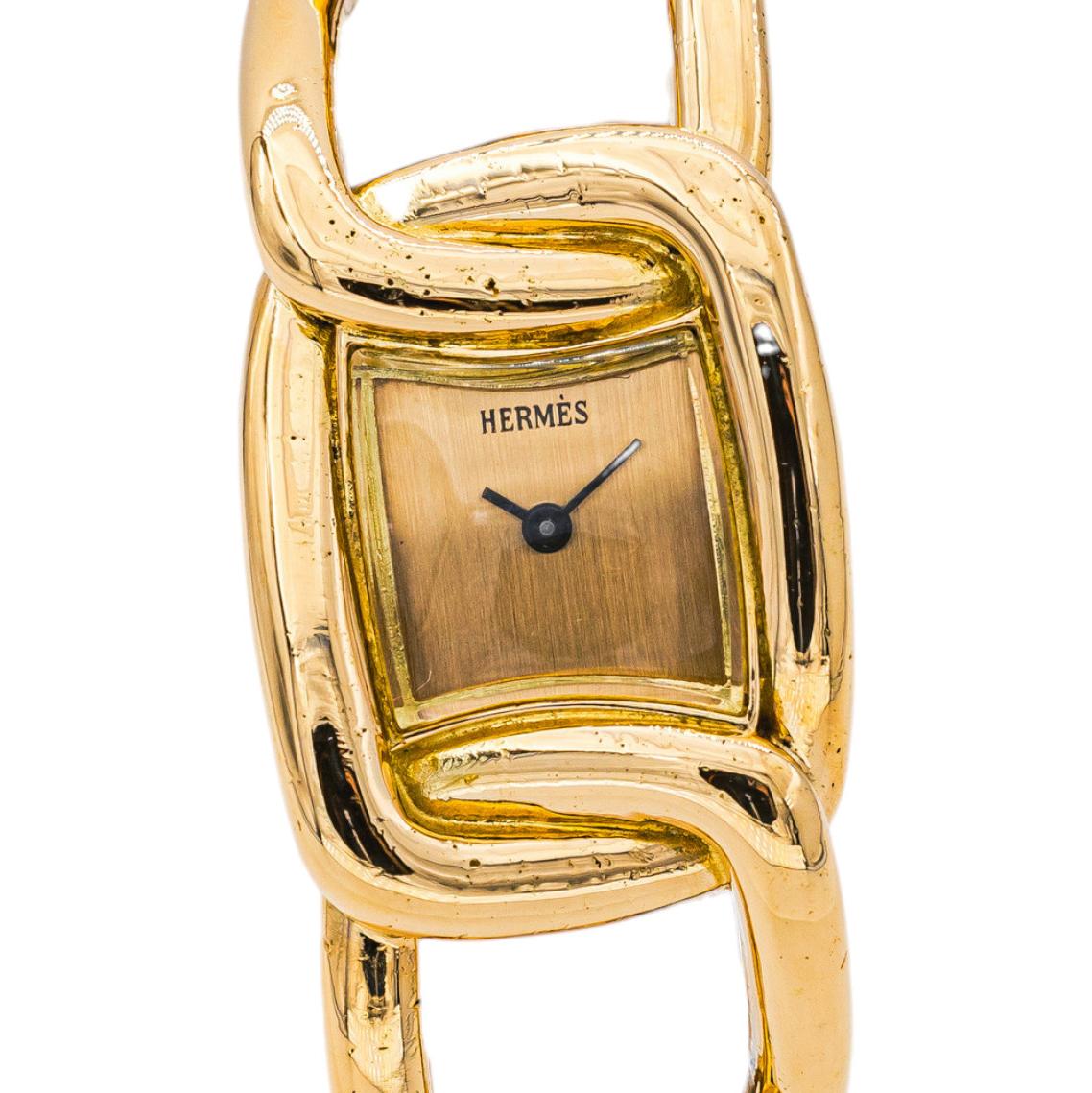Montre HERMÈS en or jaune et quartz - Castafiore