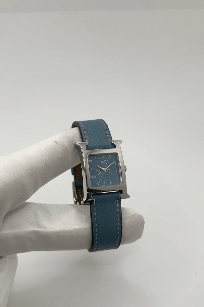 Montre HERMÈS "Heure H" en acier et cuir - Castafiore